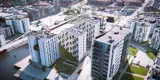 Dronefoto af de nybyggede hvide bygninger i Stenfiskerkajen i Odense